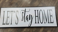 Let's Stay Home framed canvas wall art. 19 inches x 49 inches