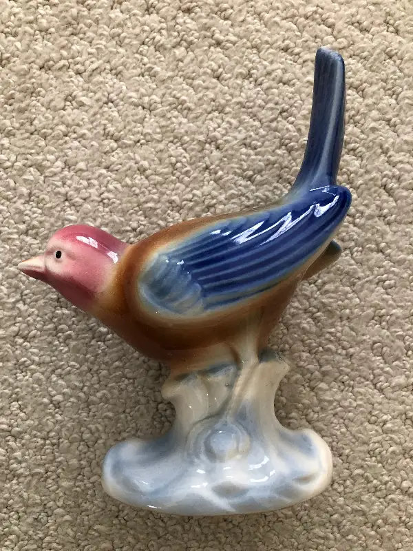 Porcelain bird figurine64595457918851121