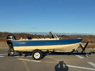 Fishing boat, motor & trailer combo. 1986 Lund Tyee - Aluminum Fishing Boat 17 feet long. No leaks,...