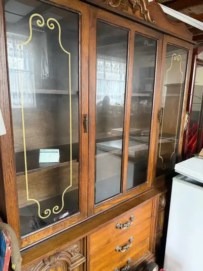 This china cabinet is used, but in good condition and features glass doors for displaying your fines...