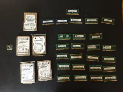 Vintage laptop parts bundle – RAM, hard drives, Wi Fi card, View more