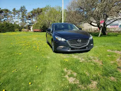 2018 Mazda 3. 6 speed standard great on gas. Inspected till August. Has an exhaust leak, think it is...
