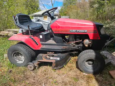 Selling a Turf-Power riding lawnmower, ideal for parts or restoration projects. It has a 12 HP engin...