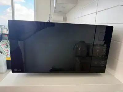 Few times used. Clean. Moved to a new unit and the new unit already have a microwave. Delivery avail...