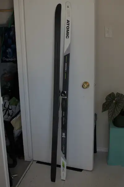 - Atomic Mover Xcruise 163cm - $50 - Rossignol Escape Positrack Xtour 191cm - $50 - Poles available...