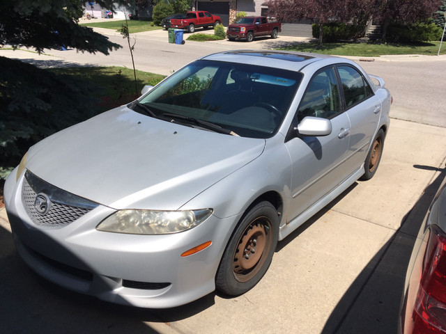 mazda protege car and driver