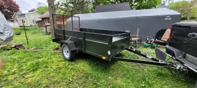 Selling my Utility trailer 14ft with fold down ramp. Asking 1900$ obo