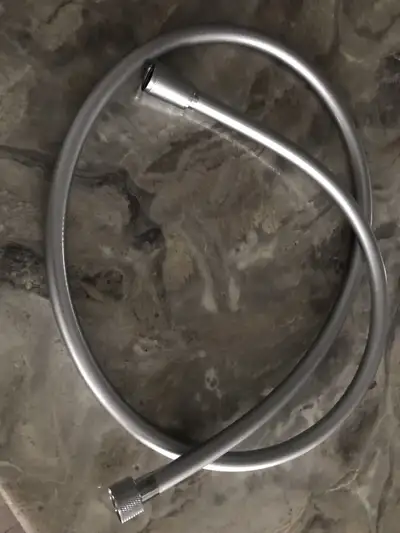5 feet shower hose (brand new) Grey colour. Very nice. It is not used. I have two of them Price $15...