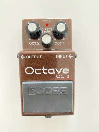 Boss OC-2 guitar pedal produces one octave below and two octaves below your original signal.