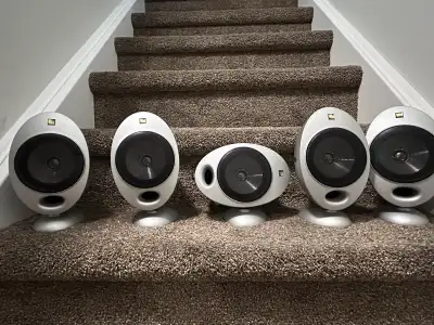 Versatile satellite speakers Multiple ways to mount or stand