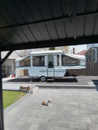 Two slide outs 1 queen 1 double . Table seats 4 folds down to small bed. Comes with 3 way fridge 3 b...