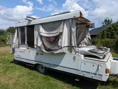 Large Bayside Elite / Grand Tour Elite folding trailer — one of Coleman’s larger and more desirable...