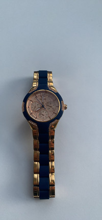 Guess rose gold/ blue watch