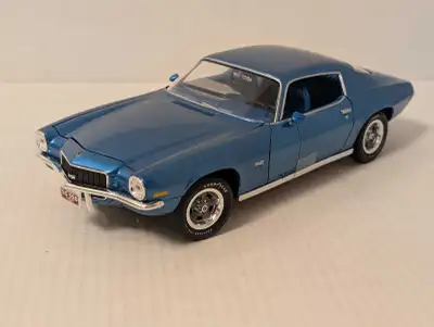 Auto World ERTL American Muscle 1/18 1971 Chevrolet Camaro SS 350 with opening parts in blue. The mo...