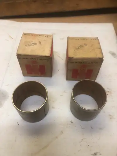 I have a pair of IH bushings with part number 55 236 D. I believe they are upoer steering spindle bu...