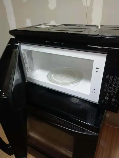 Whirlpool glass top (regular) stove and over stove microwave, View more