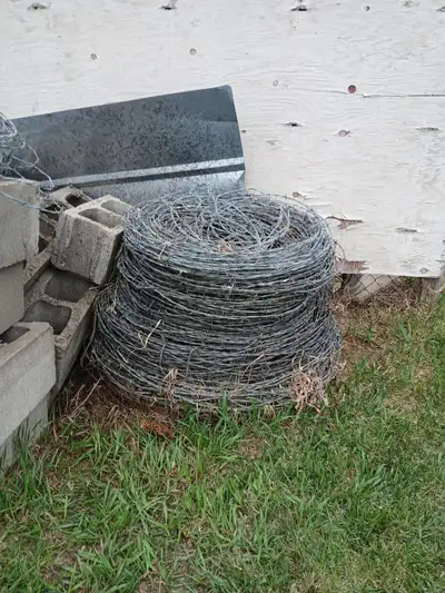Barb wire for chain link fencing.