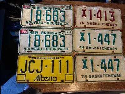 6 Saskatchewan, Alberta, New Brunswick licence plates.Saskatchew