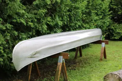 15ft Springbok Aluminum Canoe Canoe is in good condition, Durable Low Maintenance. Three Paddles and...
