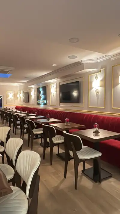 Step into Streetsville’s hidden gem — an elegant café lounge designed to impress. With modern rose-i...
