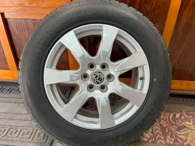 4 winter tires on aluminum rims. M+S with snowflake rating. 235/65R18 to fit GM SUV's and mid size P...