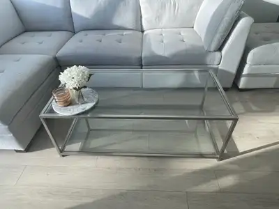 Selling a great condition double glass coffee table. Dimensions: Length = 48 inches Width = 24 inche...