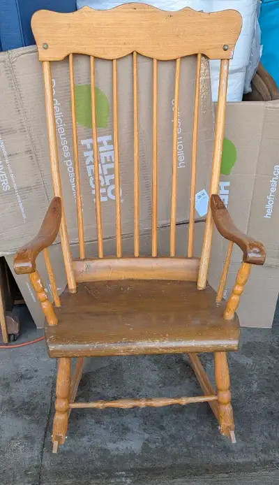 Antique Canadiana rocking chair. Refinished 25 years ago. Made of numerous kinds of wood, each with...