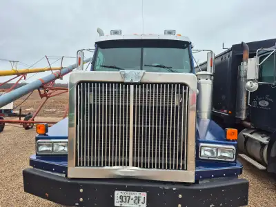 Used Western Star grain truck with a twenty foot dump box, runs great. Unknown mileage for odometer...