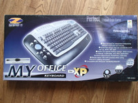 NEW/NEUF Multimedia keyboard with scroll pad and media keys