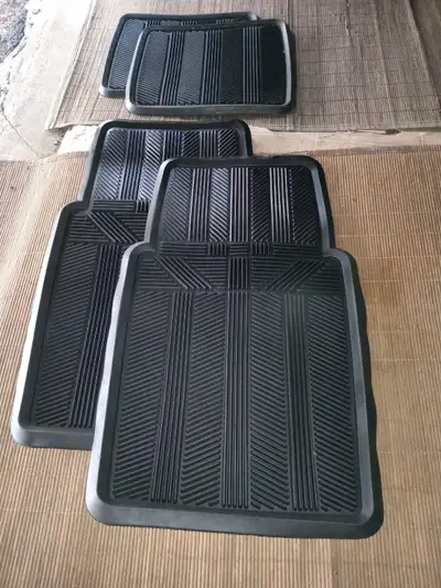 Rubber car floor mats. 2 front and 2 rear. New.