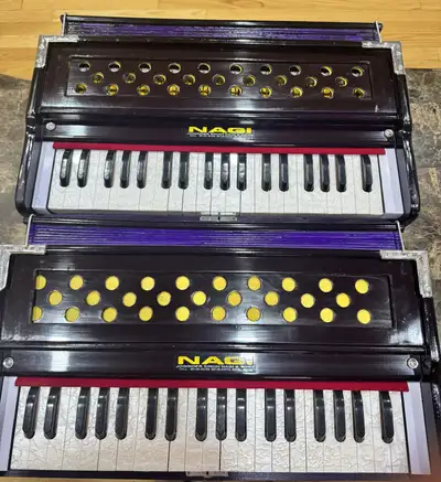 brand new professional harmonium with bag, View more