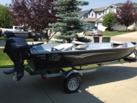 14 ft aluminum boat , motor,trailer, and accesories