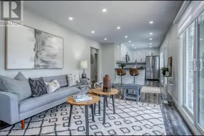 Spacious and bright upper-level unit with modern finishes, large windows, and a clean, updated feel...