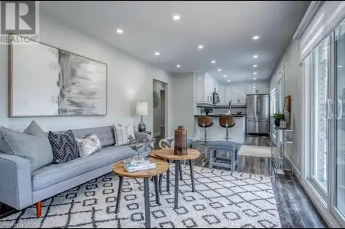 Spacious and bright upper-level unit with modern finishes, large windows, and a clean, updated feel...