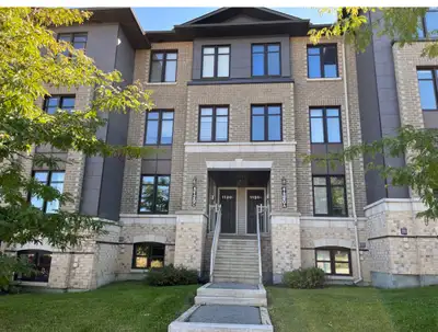 Available November 1 — a bright, move-in-ready lower-unit terrace home at 1120C Klondike Road, Kanat...