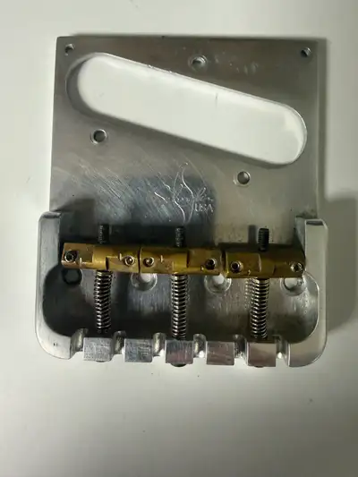 I have a Schrader Tele bridge for sale . it has the compensated brass saddles and is designed to be...