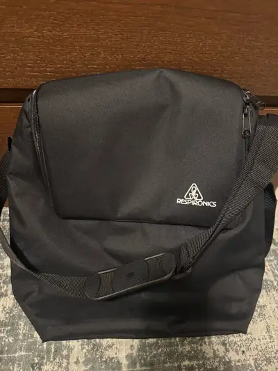I'm selling a Respironics carrying bag, perfect for travel or home storage of your CPAP or BiPAP mac...