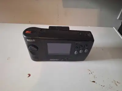 Sega Nomad with barrery pack, View more