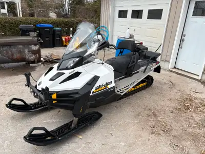 Skidoo tundra with the 600 Ace, runs awesome, 137” track. Back rest. Front auger mount. Extra wide s...
