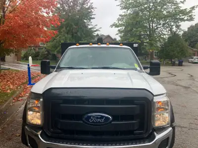 2014 Ford F550 4x4. 6.7 diesel Dump with fold down sides Car fax report available Private sale 416 7...