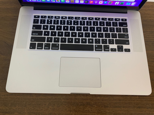 2015 MacBook Pro with brand new battery. Has Office. Free delive in Laptops in Calgary - Image 2