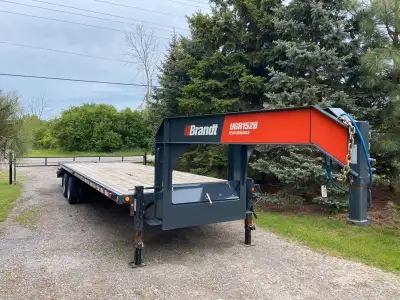 I'm selling a Brandt UGR1526 Performance flatbed trailer, perfect for hauling equipment or materials...