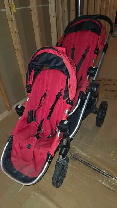 Selling a double stroller in good condition, perfect for two kids or twins. Features include two com...