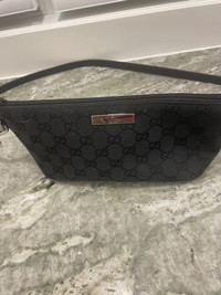 Gucci black canvas cross body purse.  Perfect condition 