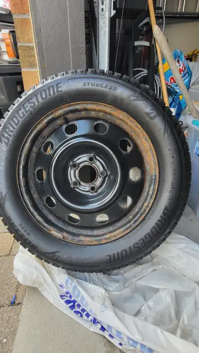 Bridgestone blizzak WS90. 232/55 R17 On rims. $100 each or all 4 for $350. Low mileage.