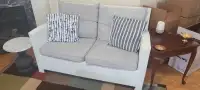 White wicker patio couch