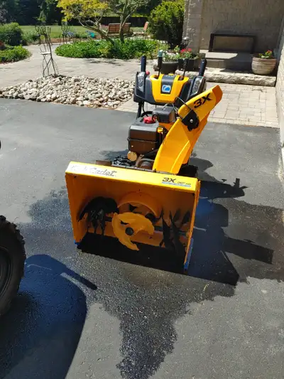 Mint condition 30 inch self-propelled snow blower, View more