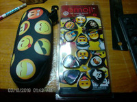 set of 12 emoji guitar pics and carrying case. $10.