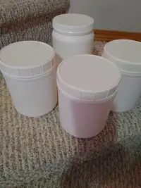 Four large size wide mouth white storage containers/ jars