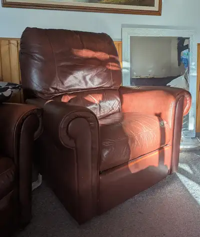 Two Brown Barca lounge chairs with Italian leather... Little wear /tear but very comfortable.